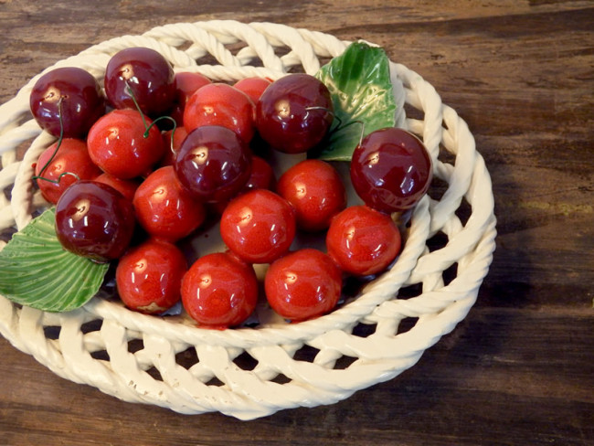 Ceramic braided bowl and cherries